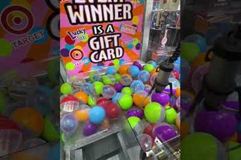 Claw machine full of mystery gift card capsules!